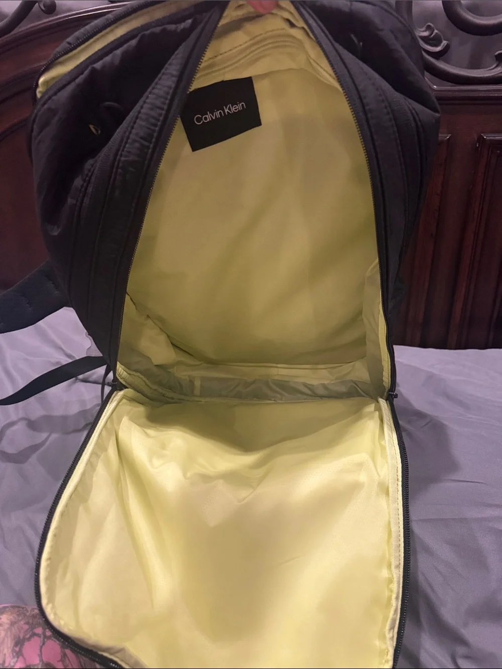 Calvin Klein Men's Black Backpack with Subtle Yellow Accents